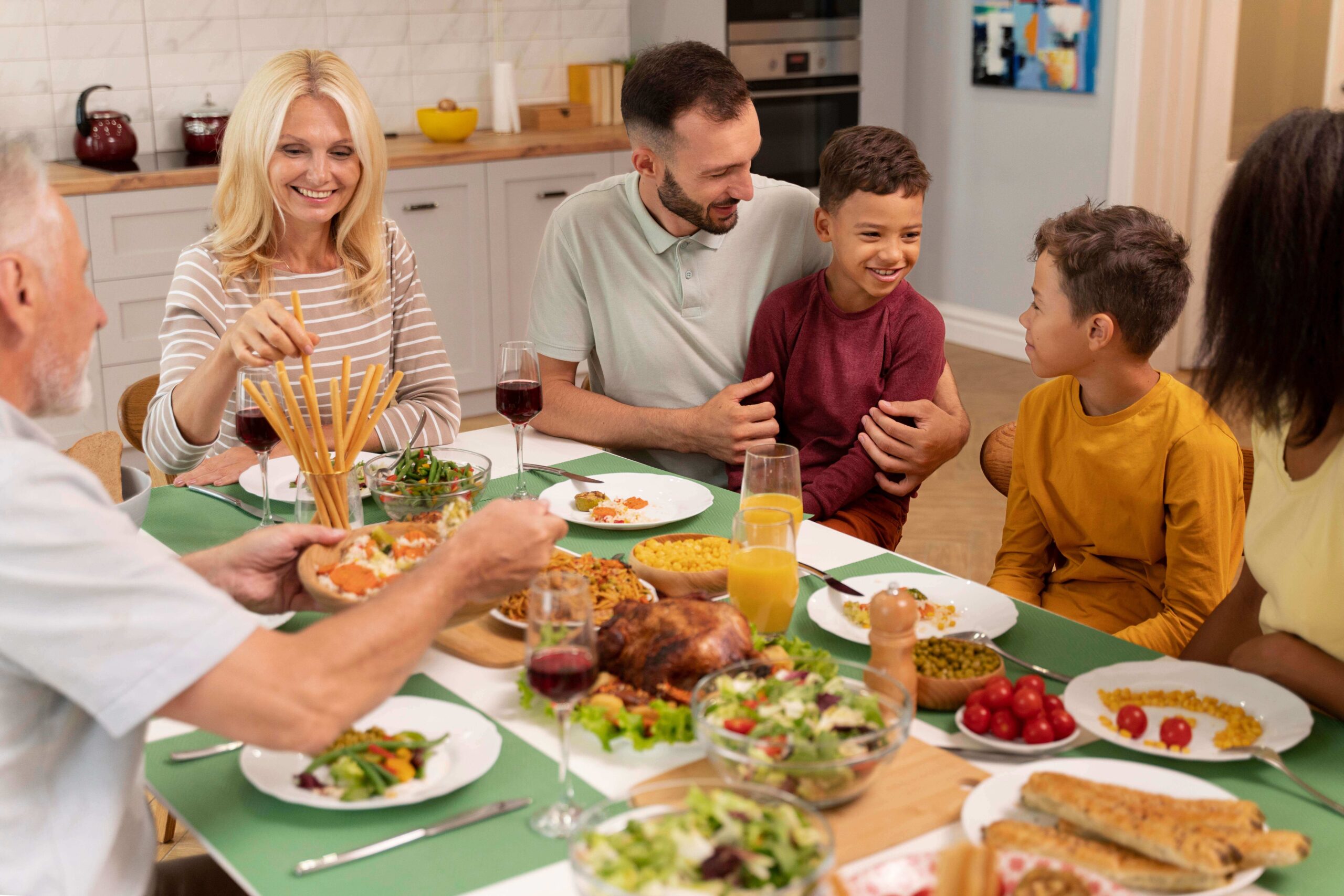 happy-family-havinf-dinner-together (1) (1)